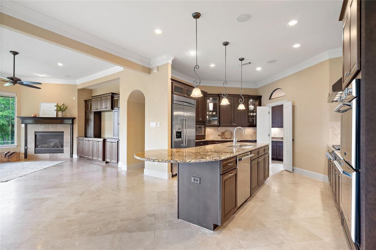 Fireplace, Interior, Kitchen, Pendant Lights, Recessed Lighting, Stainless Steel Appliances