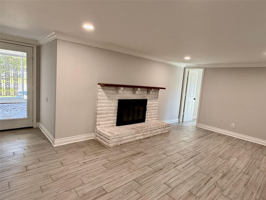 Empty room, Fireplace, Interior, Recessed Lighting, Wood Texture Flooring
