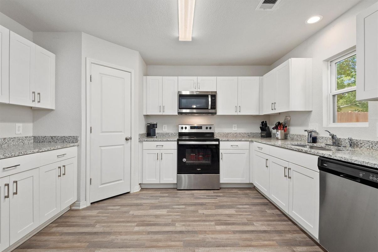 Interior, Kitchen, Recessed Lighting, Stainless Steel Appliances, Wood Texture Flooring