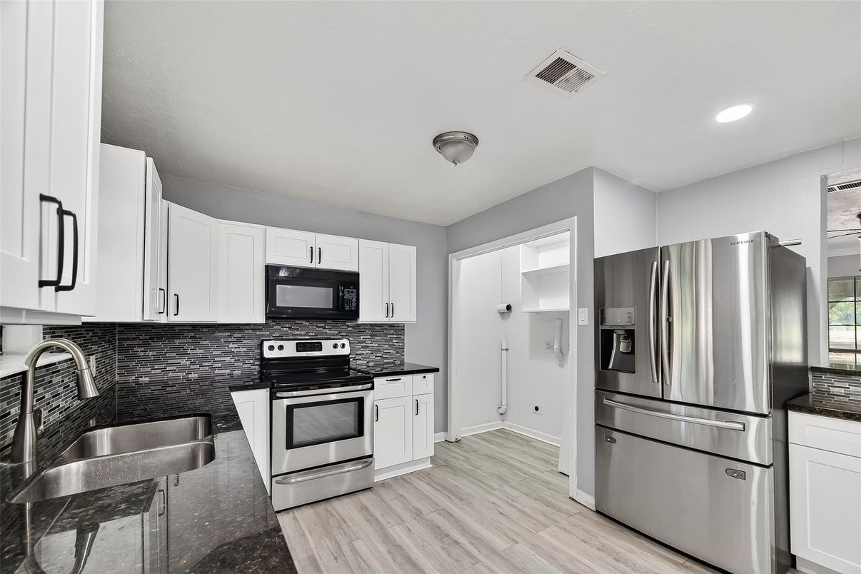 Interior, Kitchen, Recessed Lighting, Stainless Steel Appliances, Wood Texture Flooring