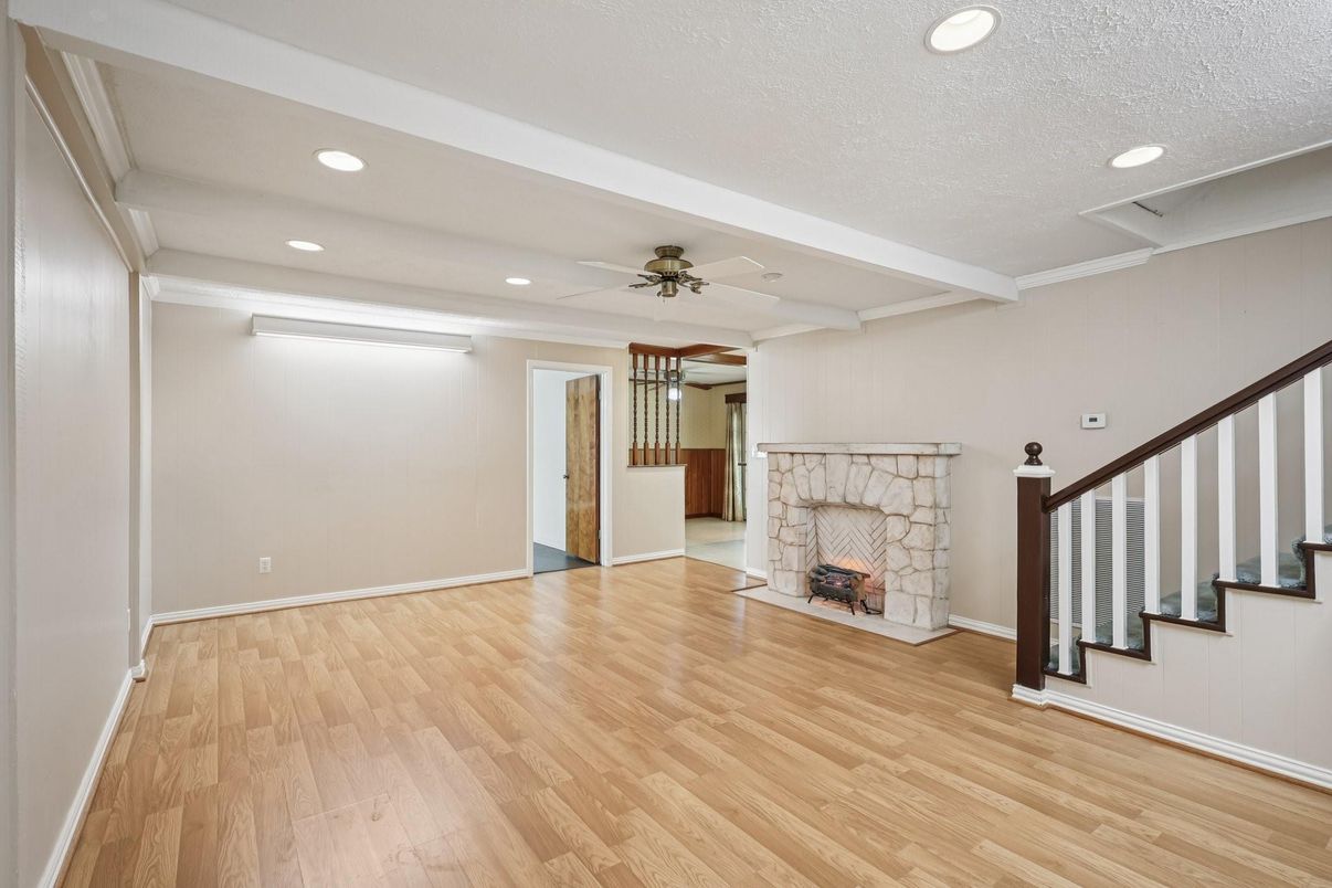 Empty room, Fireplace, Interior, Recessed Lighting, Wood Texture Flooring