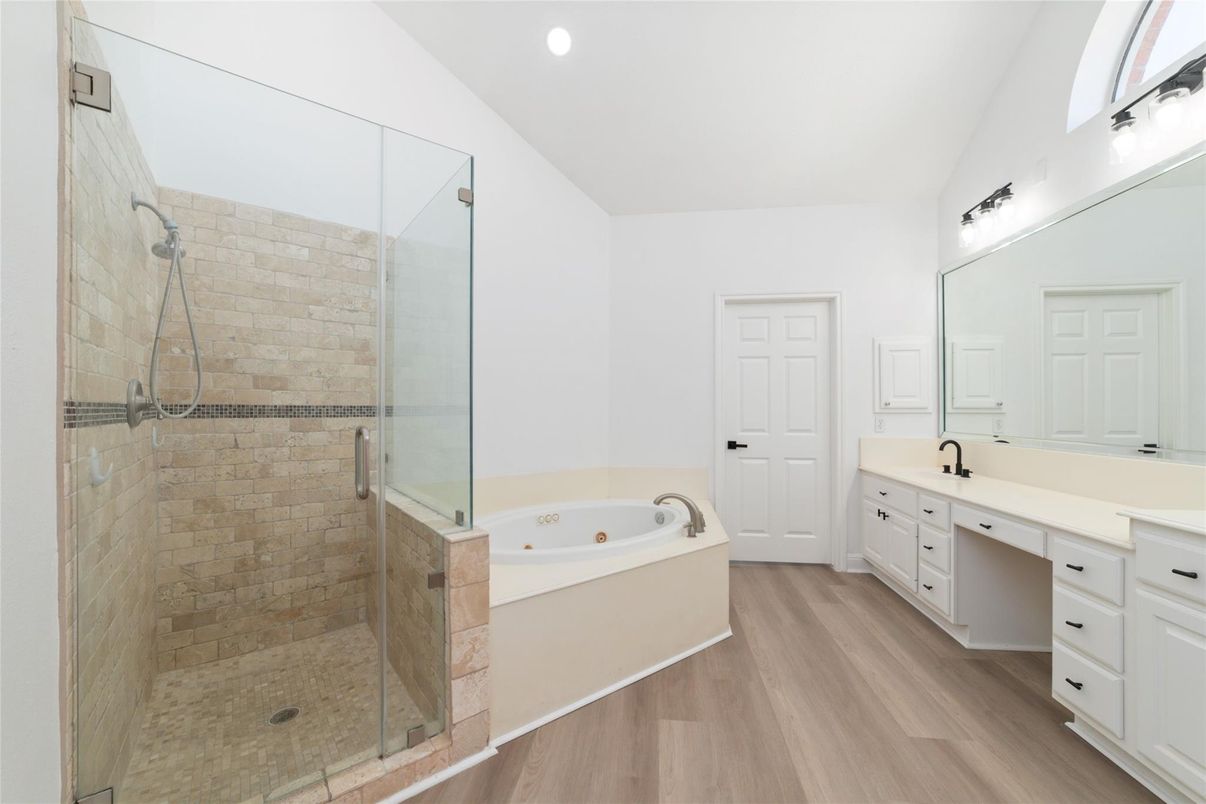 Bathroom, Dual Sink Vanities, Glass Shower, Interior, Recessed Lighting, Wood Texture Flooring