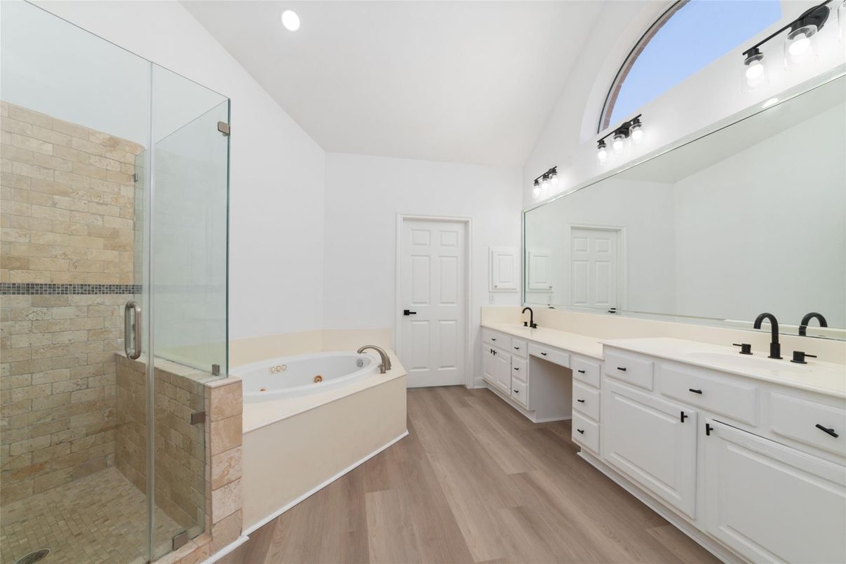 Bathroom, Dual Sink Vanities, Glass Shower, Interior, Recessed Lighting, Wood Texture Flooring