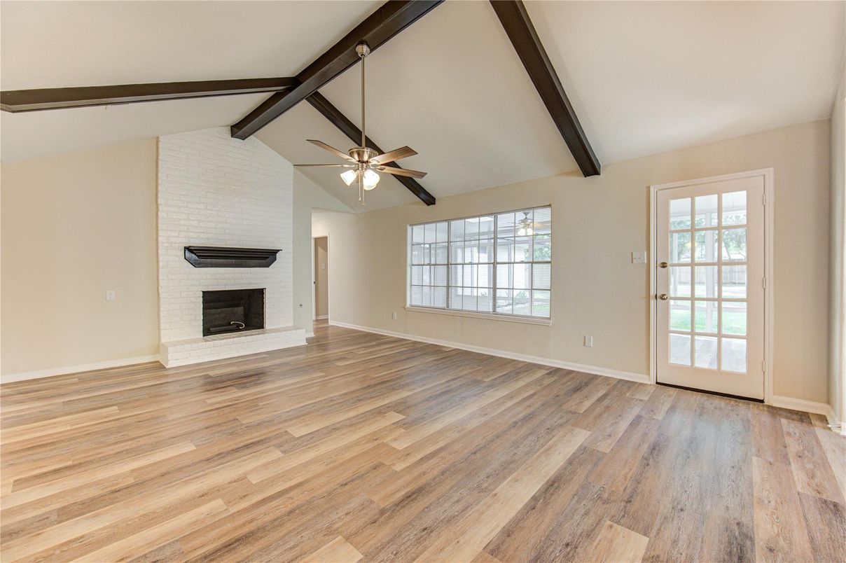 Empty room, Fireplace, Interior, Stone Walls, Wooden Beams, Wood Texture Flooring