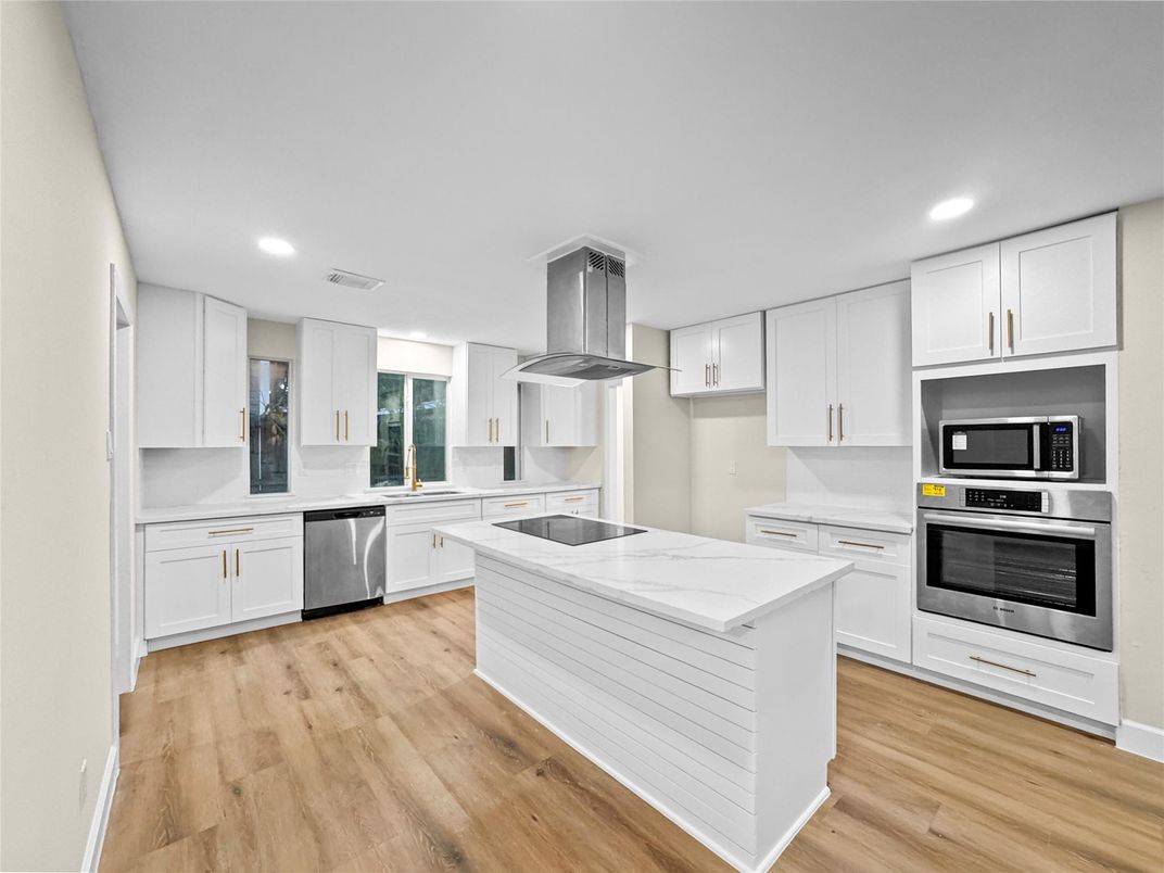 Interior, Kitchen, Recessed Lighting, Stainless Steel Appliances, Wood Texture Flooring