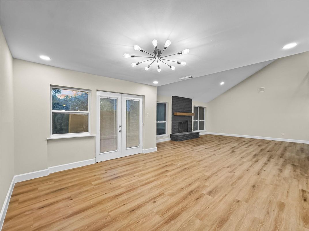 Empty room, Fireplace, Interior, Pendant Lights, Recessed Lighting, Wood Texture Flooring