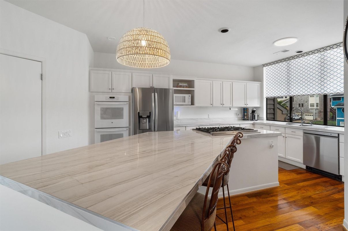 Interior, Kitchen, Pendant Lights, Recessed Lighting, Stainless Steel Appliances, Wood Texture Flooring