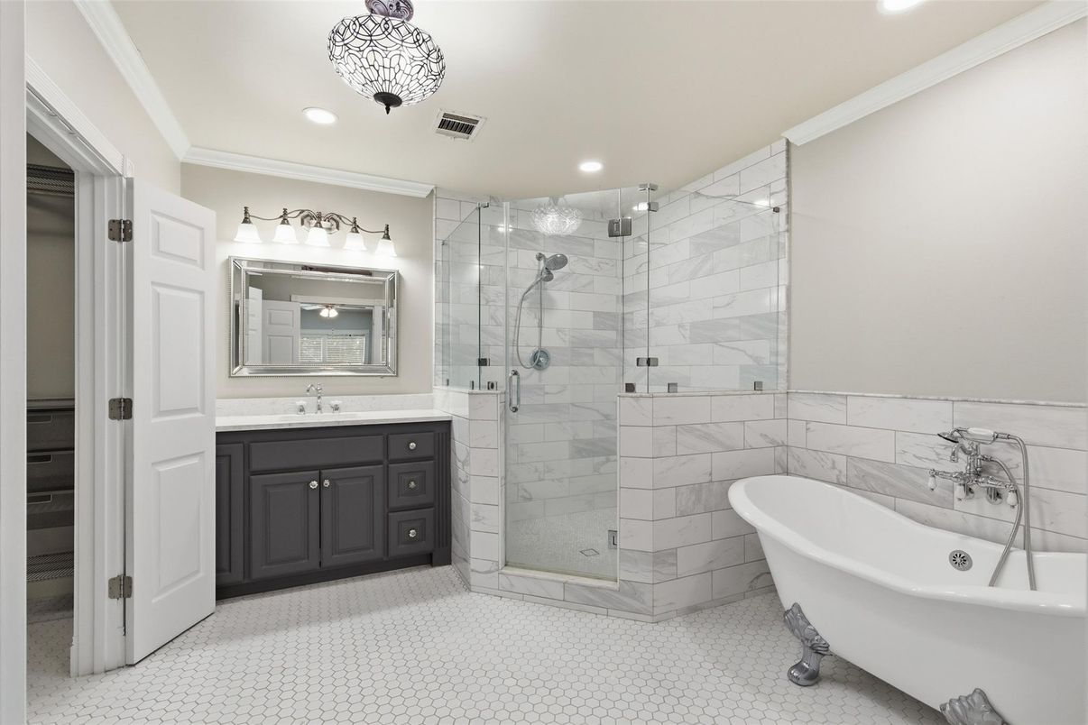 Bathroom, Free Standing Baths, Glass Shower, Interior, Marble Walls, Recessed Lighting