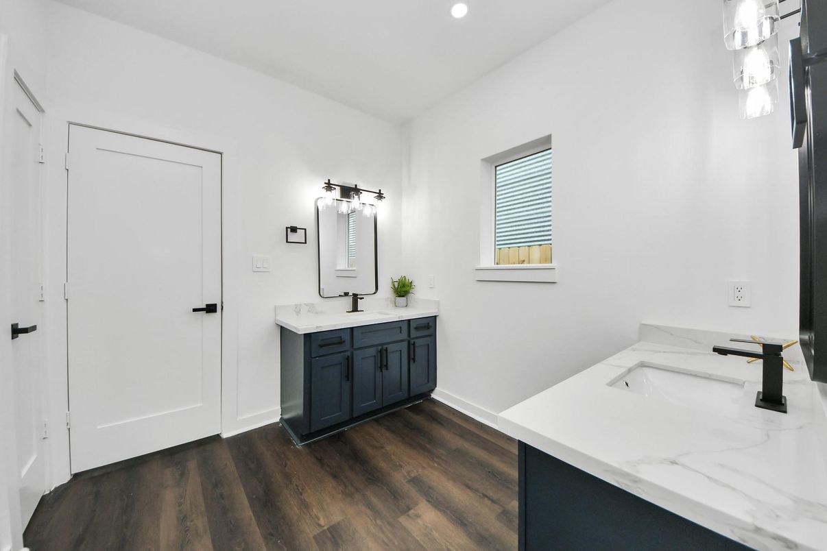 Bathroom, Dual Sink Vanities, Interior, Recessed Lighting, Wood Texture Flooring