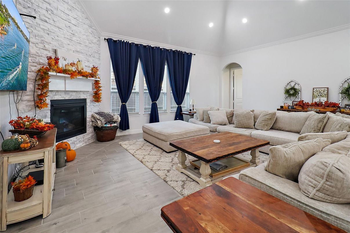 Fireplace, Interior, Living room, Recessed Lighting, Stone Walls, Wood Texture Flooring