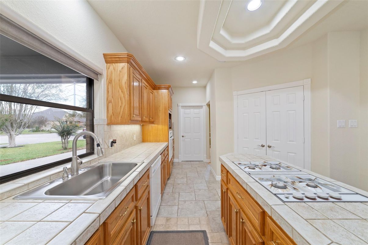 Interior, Kitchen, Recessed Lighting, Tile Countertops