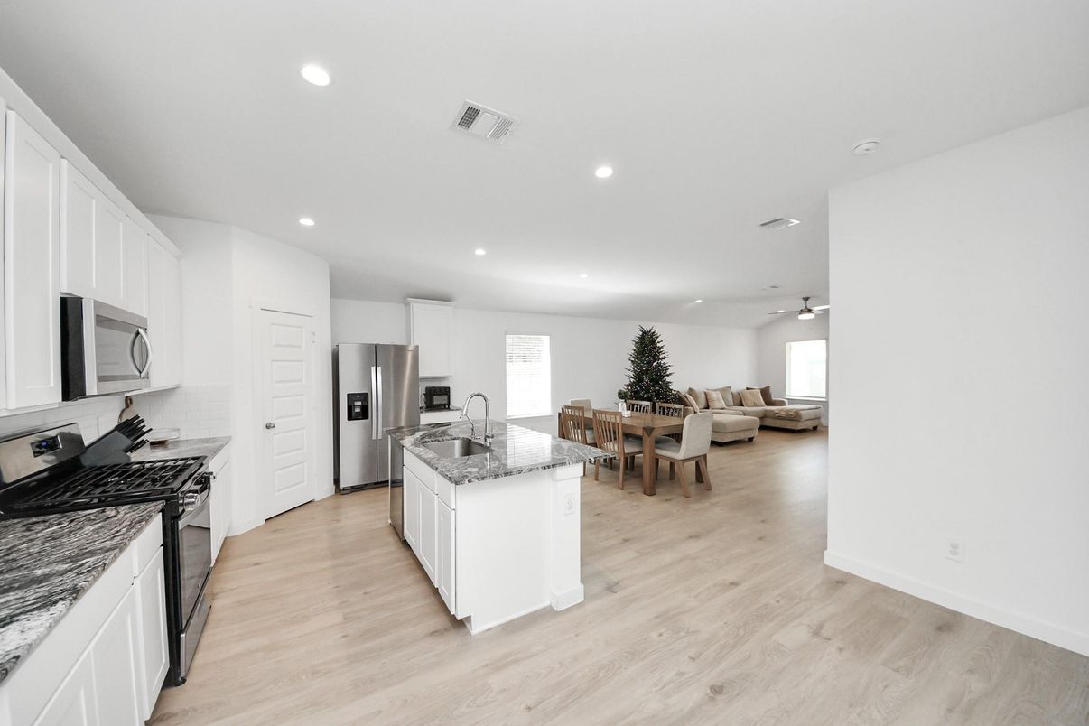 Dining room, Interior, Kitchen, Living room, Recessed Lighting, Stainless Steel Appliances, Wood Texture Flooring