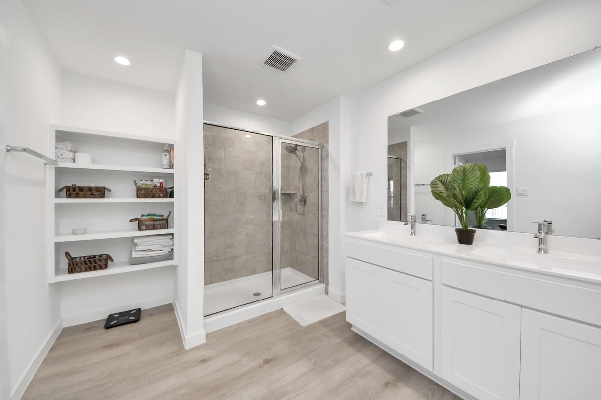 Bathroom, Dual Sink Vanities, Glass Shower, Interior, Recessed Lighting, Wood Texture Flooring