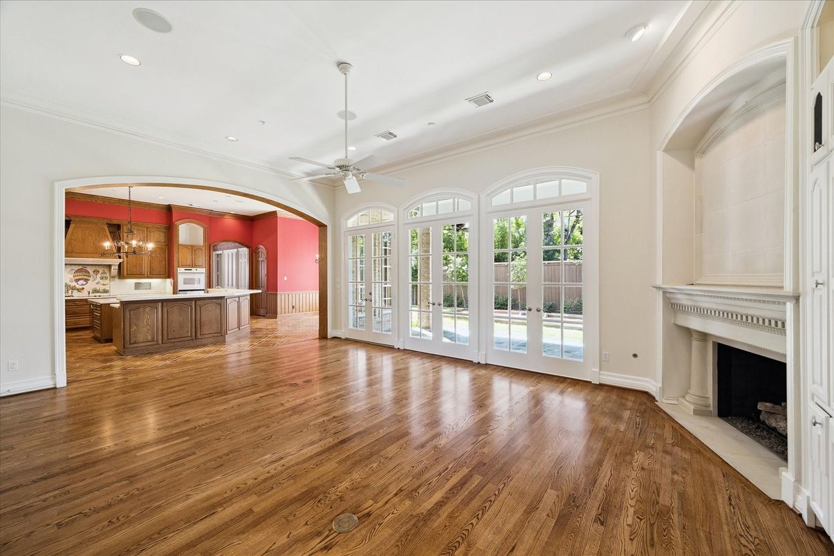 Chandelier, Empty room, Fireplace, Interior, Kitchen, Pendant Lights, Recessed Lighting, Wood Texture Flooring