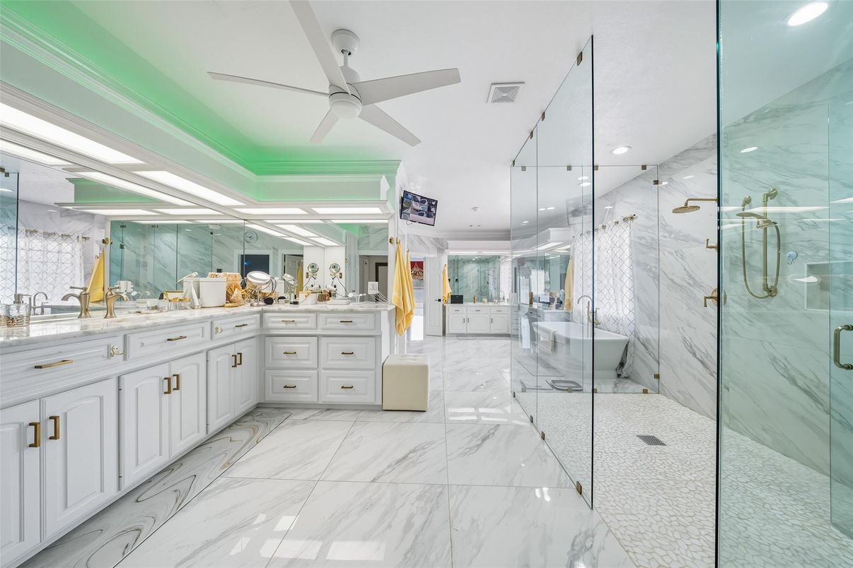 Bathroom, Dual Sink Vanities, Glass Shower, Interior, Marble, Marble Walls, Recessed Lighting