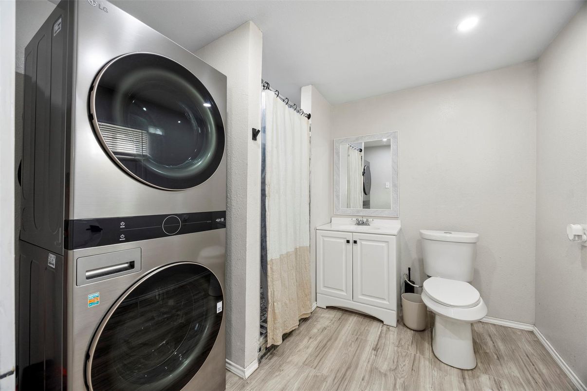 Bathroom, Interior, Recessed Lighting, Utility Closets, Washer, Wood Texture Flooring