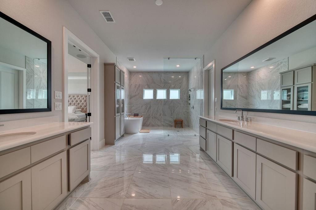 Bathroom, Dual Sink Vanities, Free Standing Baths, Glass Shower, Interior, Marble, Marble Walls, Recessed Lighting