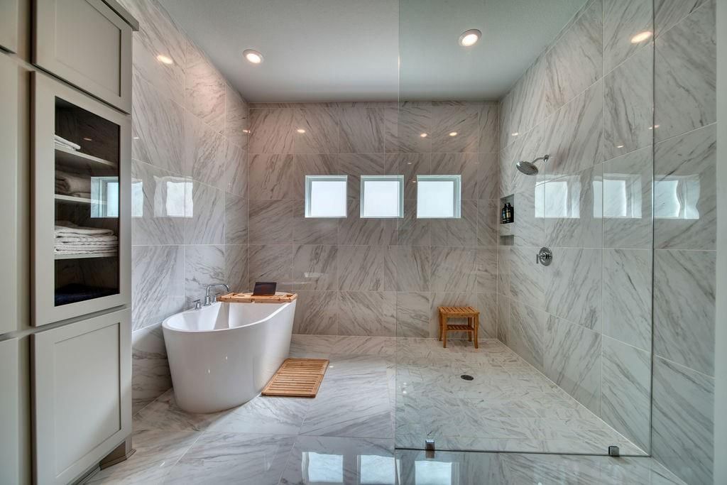 Bathroom, Free Standing Baths, Glass Shower, Interior, Marble, Marble Walls, Recessed Lighting