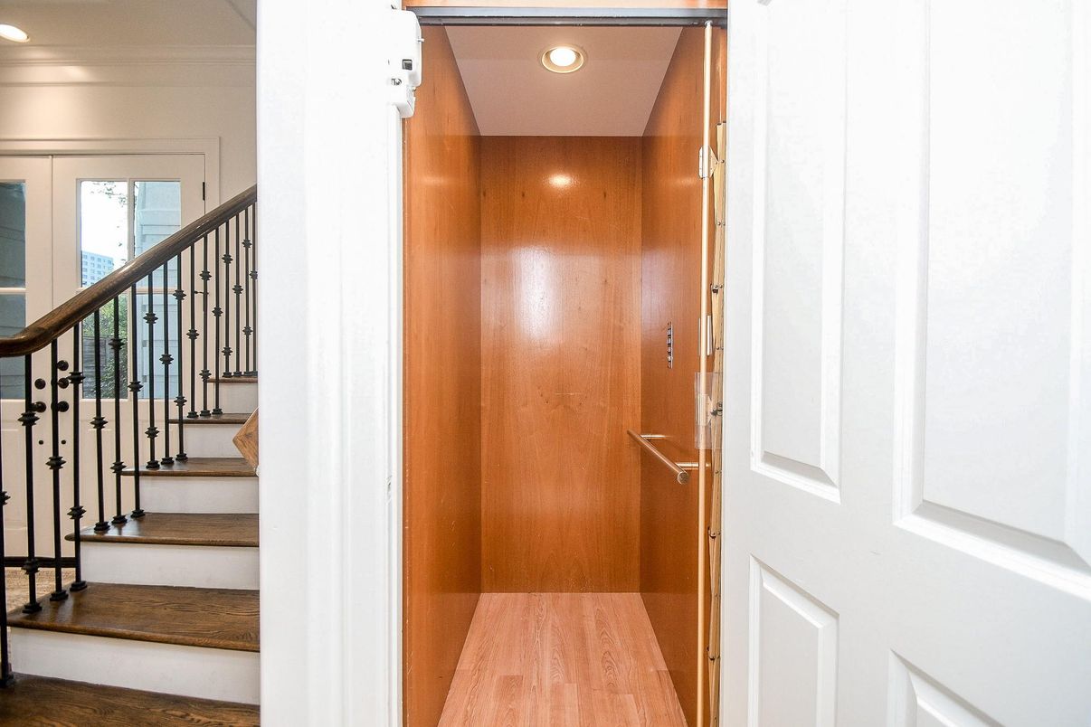 Elevator, Interior, Recessed Lighting, Wood Texture Flooring, Wooden Walls