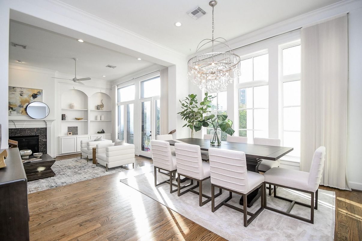 Chandelier, Dining room, Fireplace, Interior, Living room, Recessed Lighting, Wood Texture Flooring