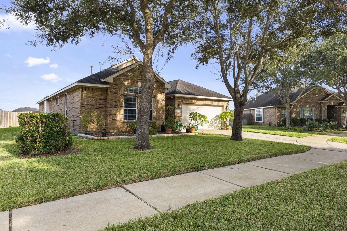 Attached, Backyard, Exterior, Facade, Brick Facade, Brick Traditional