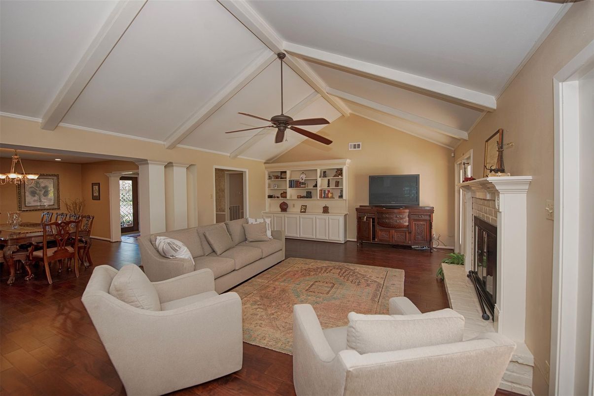 Chandelier, Dining room, Fireplace, Interior, Living room, Recessed Lighting, Wood Texture Flooring