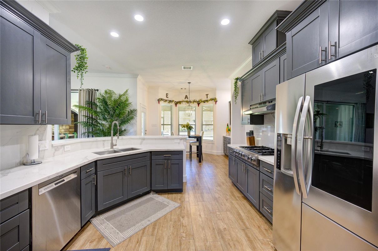 Interior, Kitchen, Recessed Lighting, Stainless Steel Appliances, Wood Texture Flooring