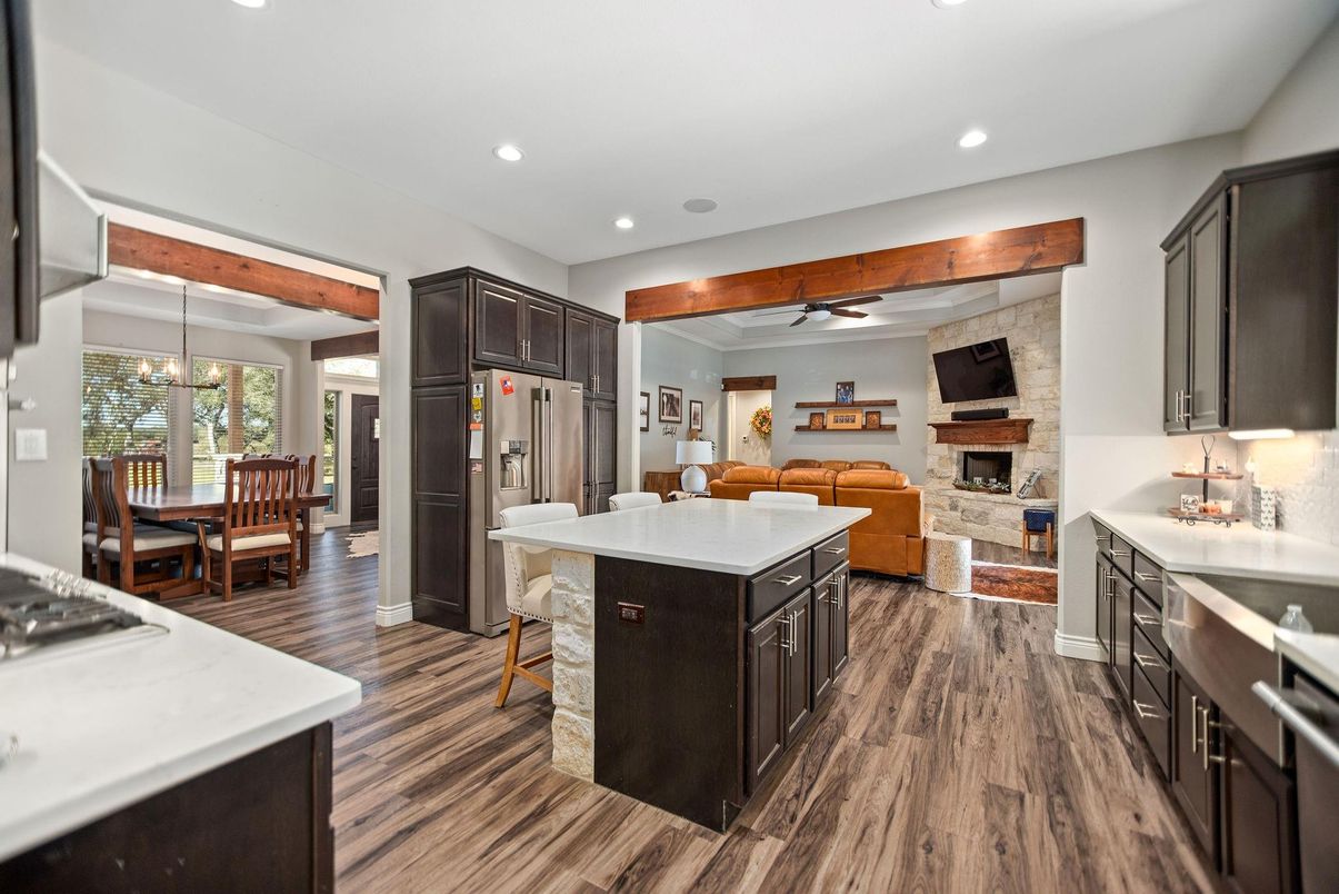 Dining room, Fireplace, Interior, Kitchen, Living room, Pendant Lights, Recessed Lighting, Stone Walls, Wood Texture Flooring