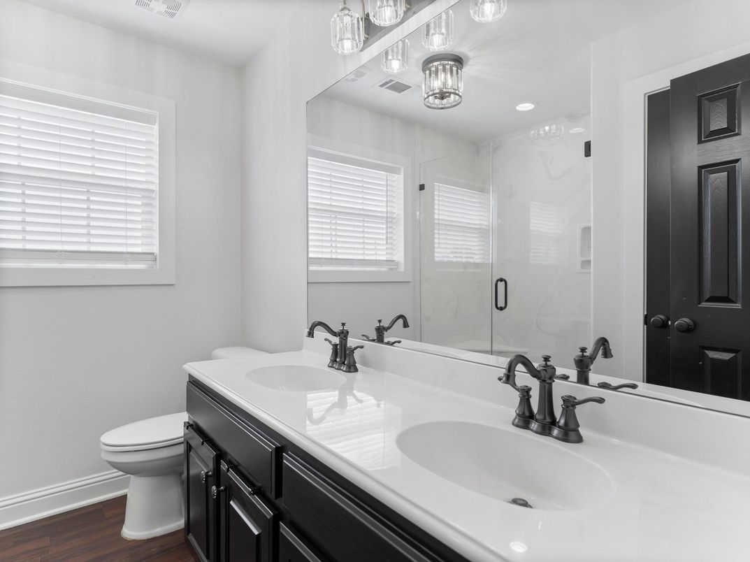 Bathroom, Dual Sink Vanities, Glass Shower, Interior, Recessed Lighting, Wood Texture Flooring