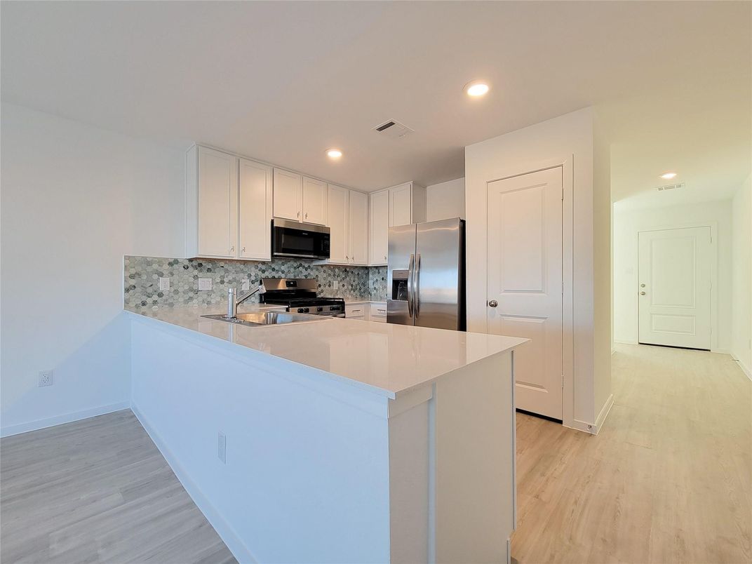 Interior, Kitchen, Recessed Lighting, Stainless Steel Appliances, Wood Texture Flooring