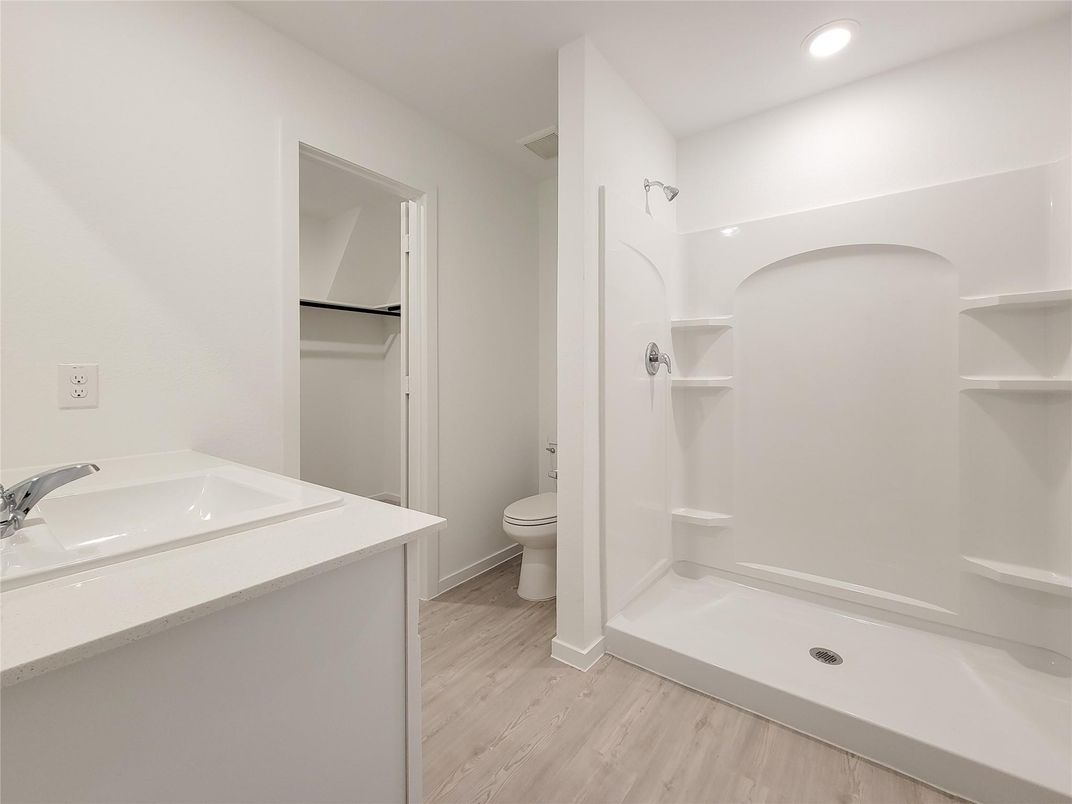 Bathroom, Dual Sink Vanities, Interior, Recessed Lighting, Wood Texture Flooring