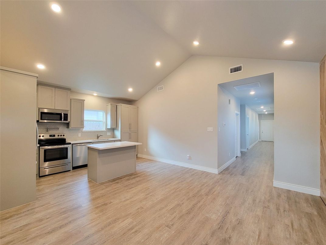 Interior, Kitchen, Recessed Lighting, Stainless Steel Appliances, Wood Texture Flooring