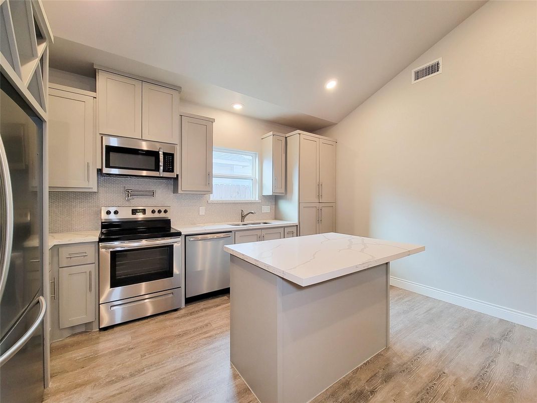 Interior, Kitchen, Recessed Lighting, Stainless Steel Appliances, Wood Texture Flooring