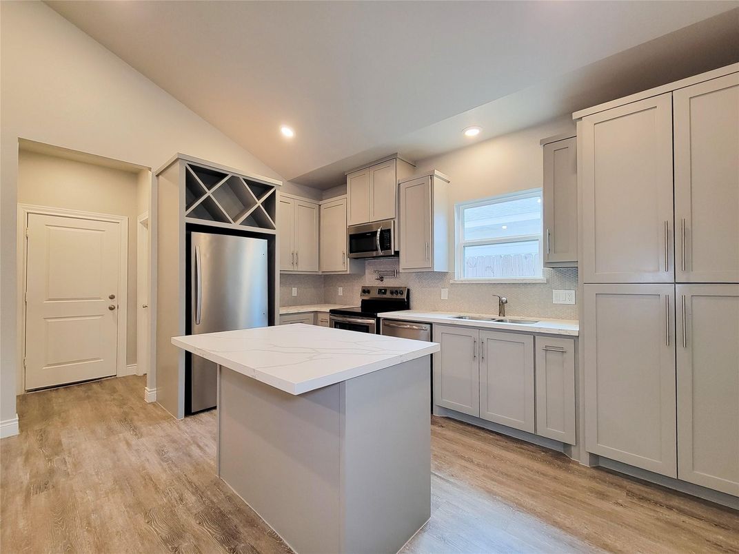 Interior, Kitchen, Recessed Lighting, Stainless Steel Appliances, Wood Texture Flooring