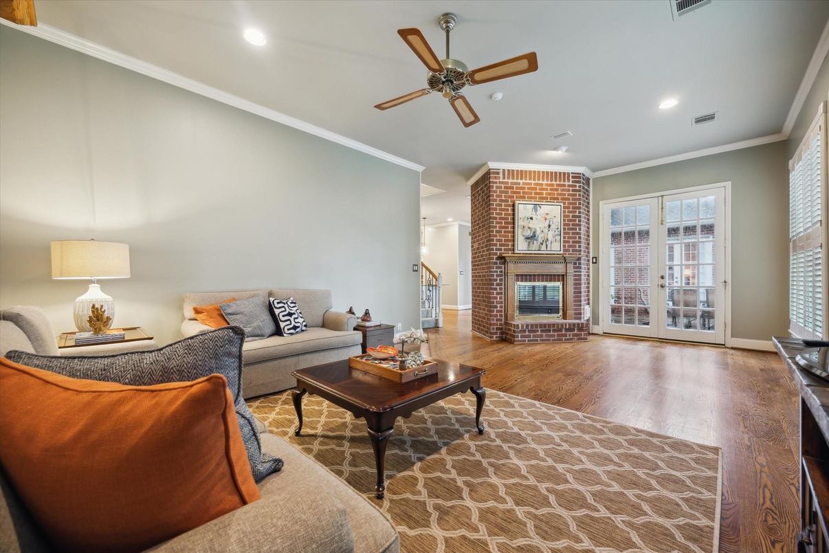 Fireplace, Interior, Living room, Recessed Lighting, Stone Walls, Wood Texture Flooring