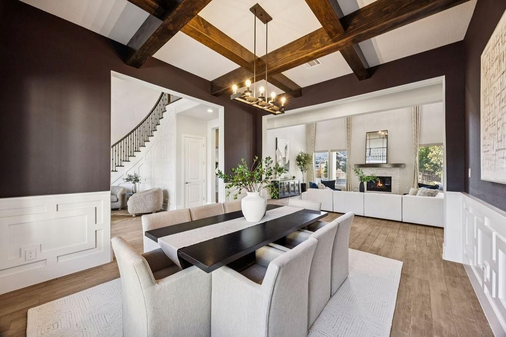 Chandelier, Dining room, Fireplace, Interior, Living room, Pendant Lights, Recessed Lighting, Wooden Beams, Wood Texture Flooring