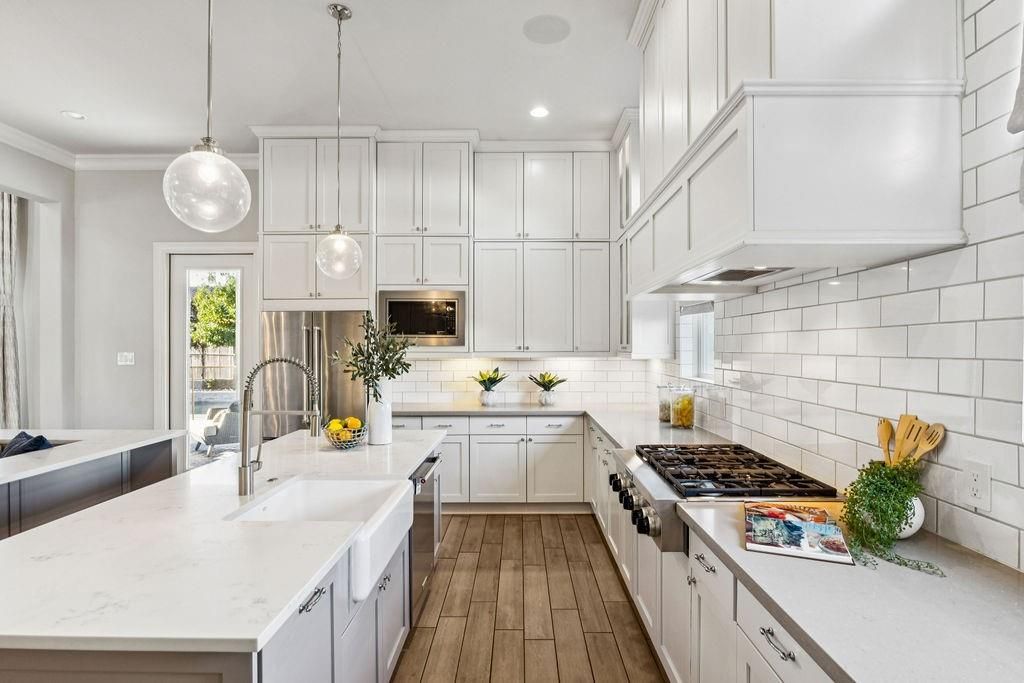 Interior, Kitchen, Pendant Lights, Recessed Lighting, Stainless Steel Appliances, Wood Texture Flooring