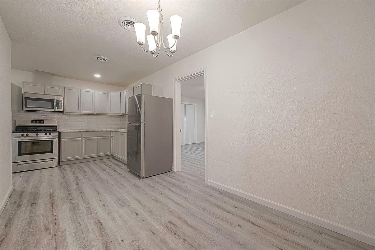 Chandelier, Interior, Kitchen, Recessed Lighting, Stainless Steel Appliances, Wood Texture Flooring