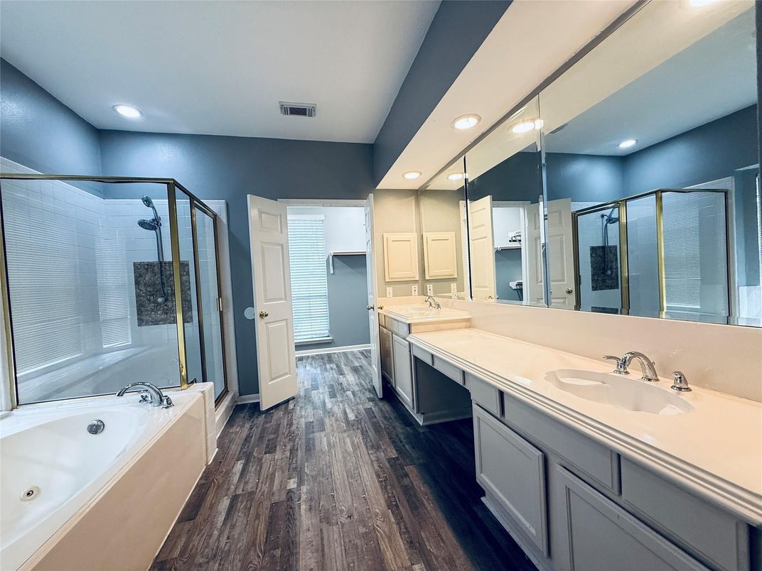 Bathroom, Dual Sink Vanities, Glass Shower, Interior, Recessed Lighting, Wood Texture Flooring