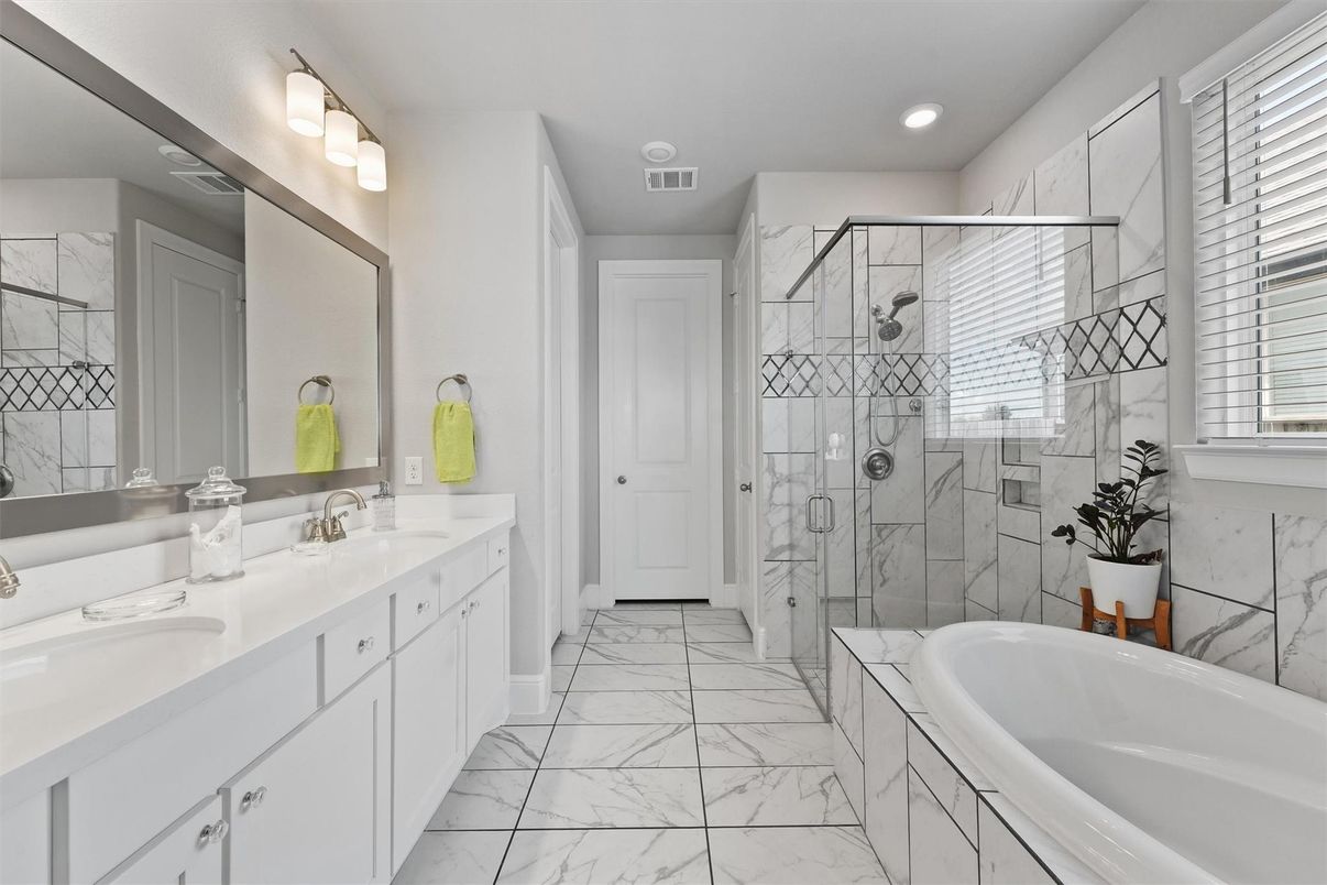 Bathroom, Dual Sink Vanities, Glass Shower, Interior, Marble, Marble Walls, Recessed Lighting