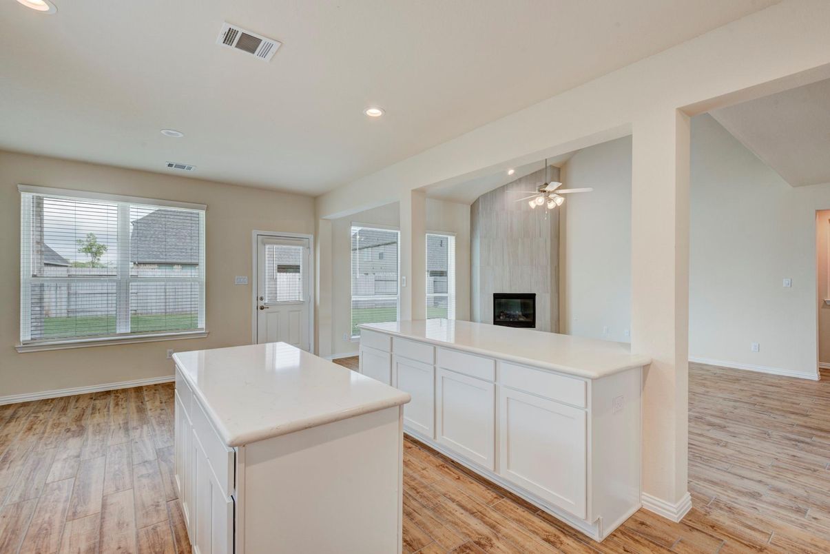 Fireplace, Interior, Kitchen, Recessed Lighting, Wood Texture Flooring