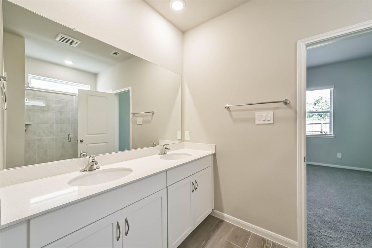 Bathroom, Dual Sink Vanities, Glass Shower, Interior, Recessed Lighting, Wood Texture Flooring