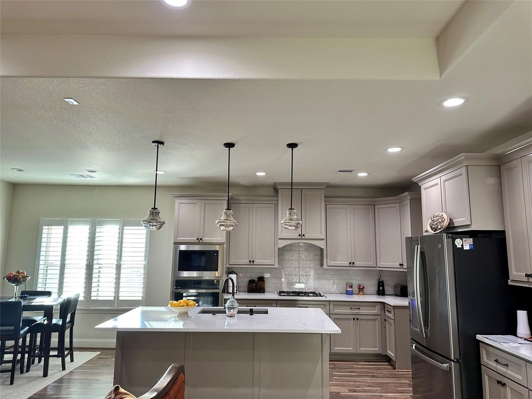 Interior, Kitchen, Pendant Lights, Recessed Lighting, Stainless Steel Appliances, Wood Texture Flooring
