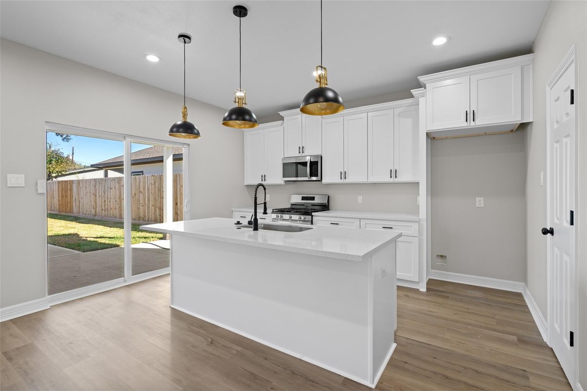 Interior, Kitchen, Pendant Lights, Recessed Lighting, Stainless Steel Appliances, Wood Texture Flooring
