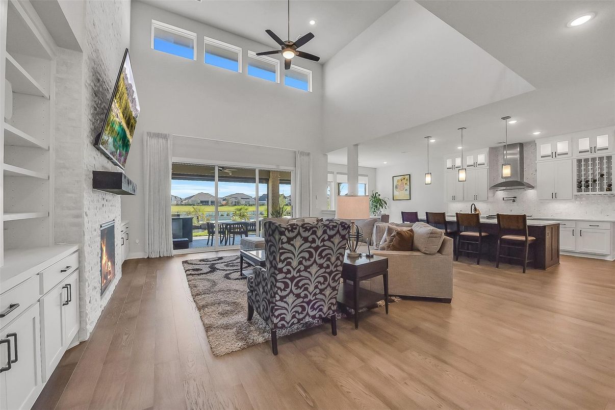 Dining room, Fireplace, Interior, Kitchen, Living room, Pendant Lights, Recessed Lighting, Wood Texture Flooring
