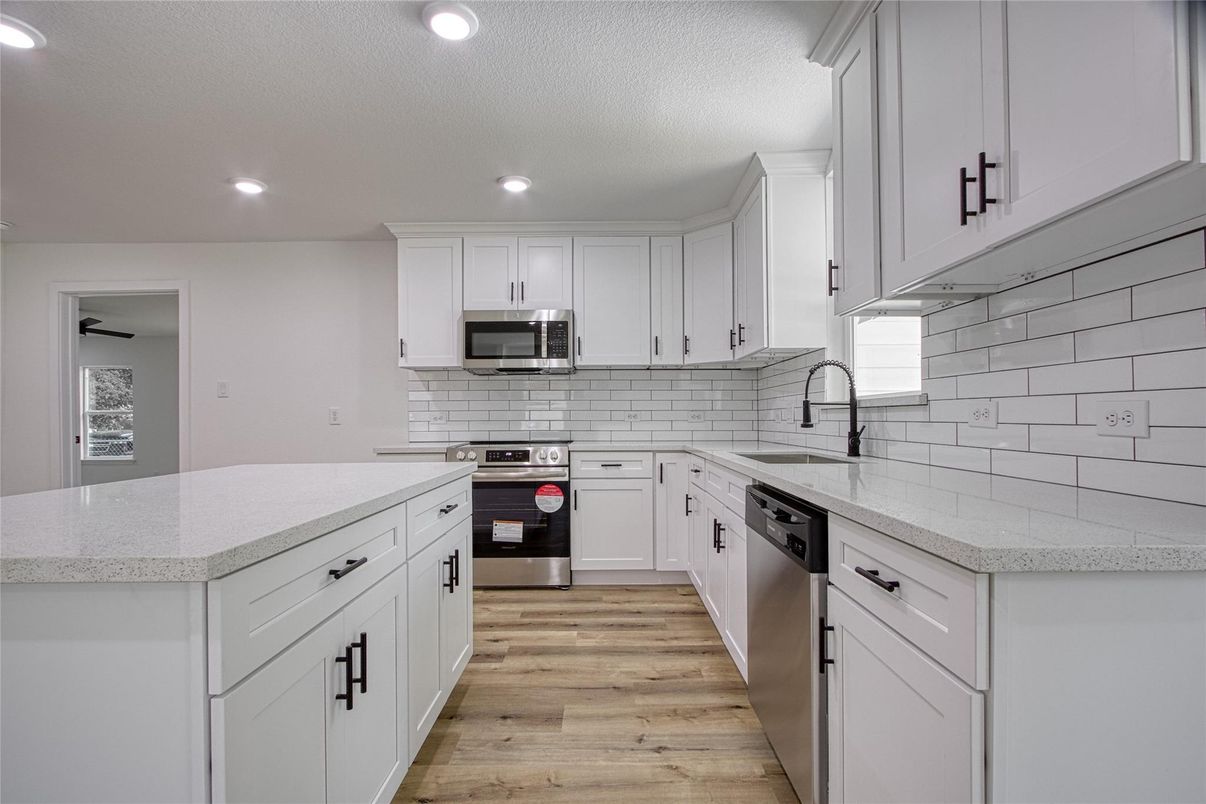 Interior, Kitchen, Recessed Lighting, Stainless Steel Appliances, Wood Texture Flooring