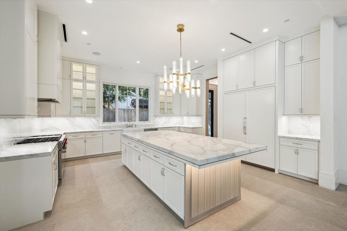 Interior, Kitchen, Marble Walls, Pendant Lights, Recessed Lighting, Stainless Steel Appliances