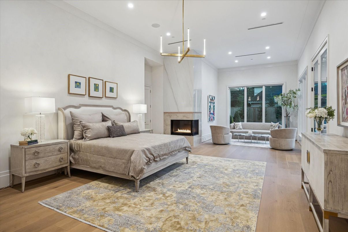 Bedroom, Fireplace, Interior, Pendant Lights, Recessed Lighting, Wood Texture Flooring