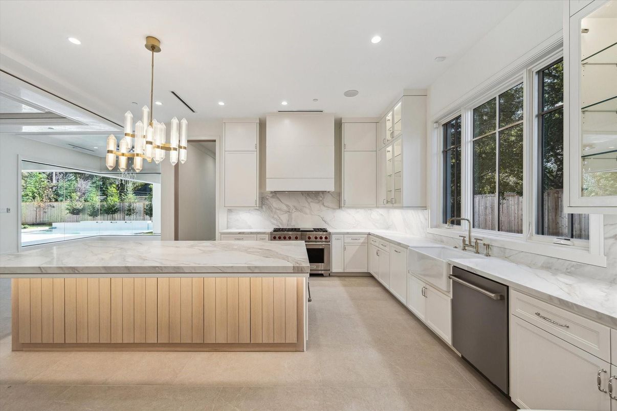 Interior, Kitchen, Marble Walls, Pendant Lights, Recessed Lighting, Stainless Steel Appliances