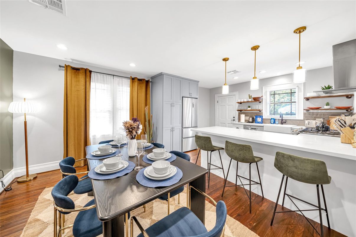 Dining room, Interior, Kitchen, Pendant Lights, Recessed Lighting, Stainless Steel Appliances, Wood Texture Flooring